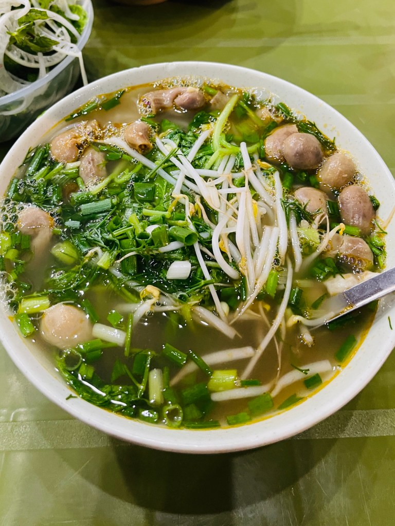 A bowl of Dạ Dày Cá Soup