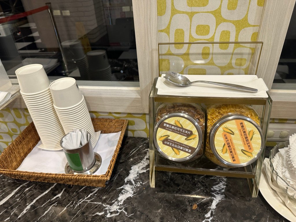 Cups and choco/corn flakes for ice cream toppings
